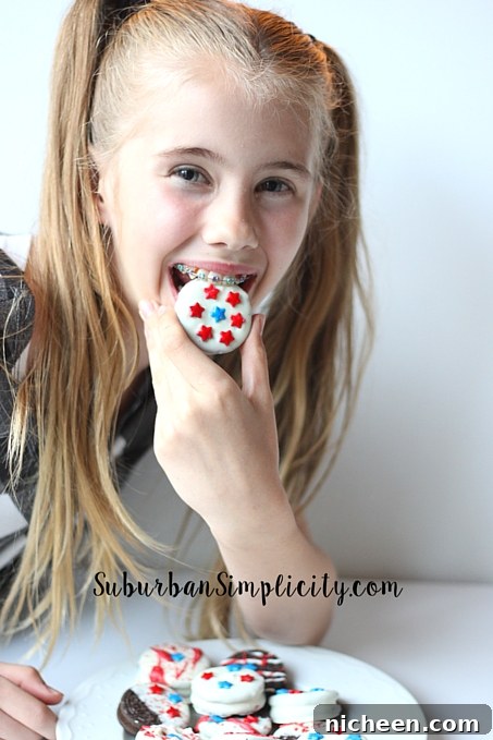 Looking for an easy red, white and blue treat for your Memorial Day or 4th of July BBQ, picnic or potluck? Then you have to try these chocolate dipped Patriotic Oreos! Pretty and delicious!