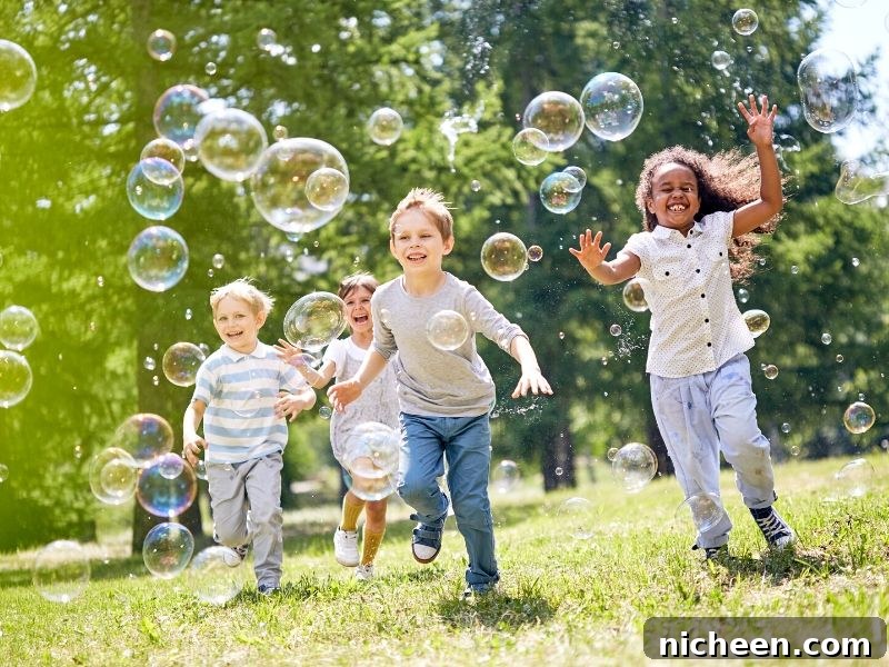 A Summer Bucket List of 50 fun things to do with kids this summer. Plus a FREE printable. Great ideas to  create memories and keep kids entertained during the summer months.