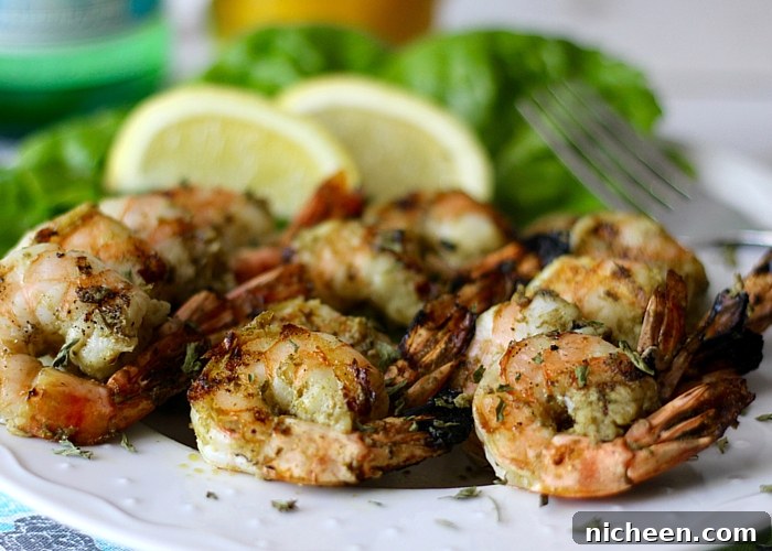 Grilled Pesto Shrimp Skewers are a perfect summer recipe idea! Easy to make, healthy and please a crowd. Skewers are for much more than beef and chicken!