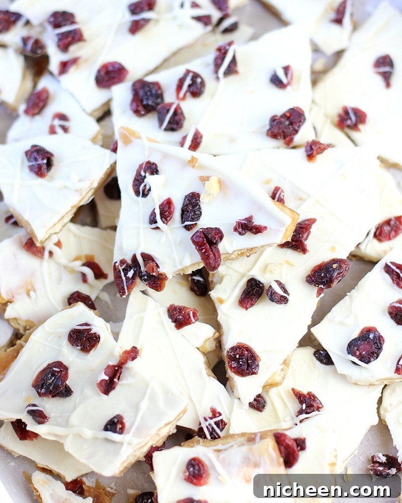 Cranberry Bliss Saltine Toffee Bars with White Chocolate 6 Cranberry Bliss Saltine Toffee is the best holiday treat idea! Crispy crackers, sweet caramel and melted white chocolate topped with tart cranberries. The perfect dessert combination!
