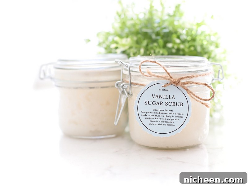 Homemade Vanilla Sugar Scrub and Free Printable Labels 5 Sugar scrub on a counter with a ribbon and tag tied around it.