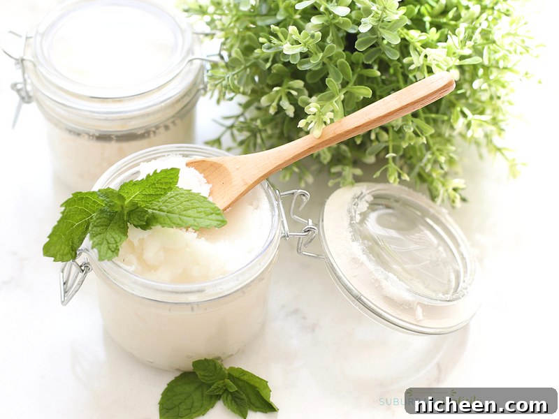 How Sugar Scrubs Improve Skin Texture and Boost Glow 5 Mint sugar scrub with a wooden spoon on top.