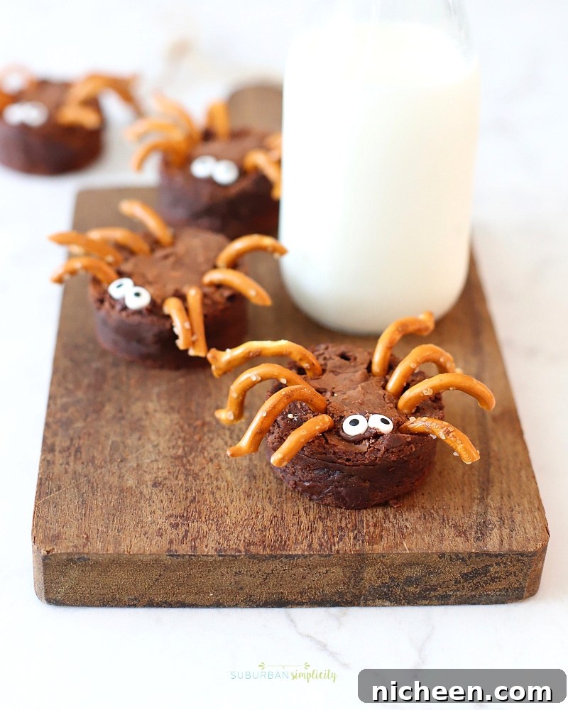 Halloween Spider recipe on a cutting board with milk.
