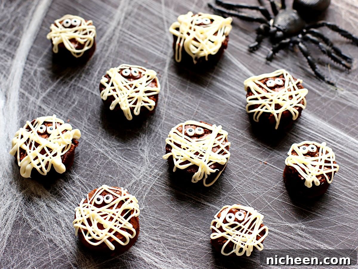 Halloween Mummy Brownies Recipe: Creepy Wrapped Treats 6 Round Brownie mummies for Halloween.