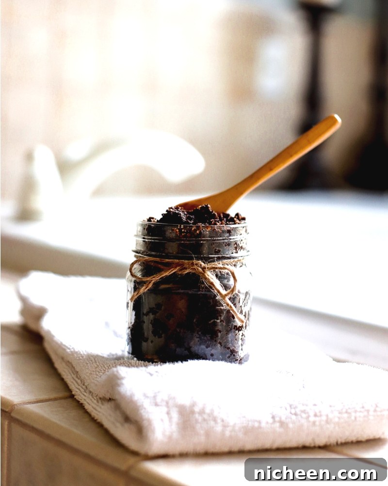 DIY Coffee Sugar Scrub Recipe for Glowing Skin 3 Coffee sugar scrub by a tub.