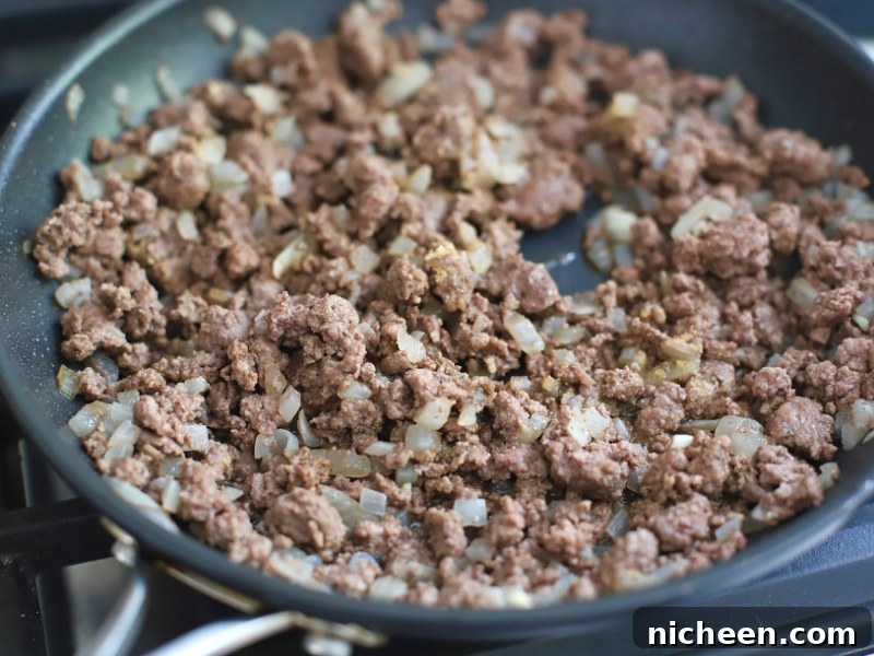 Slow Cooker Tater Tot Casserole 4 Sautéed ground beef and onions.