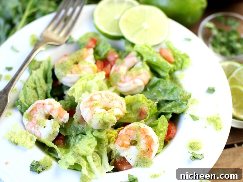 A delicious shrimp salad with avocado cilantro lime dressing.