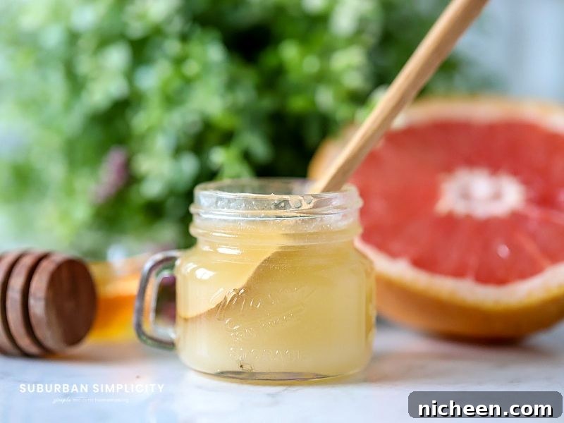 DIY lip scrub with a wooden spoon in it.