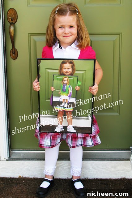 17 First Day of School Photo Ideas and Poses 6 A little girl posing for a picture