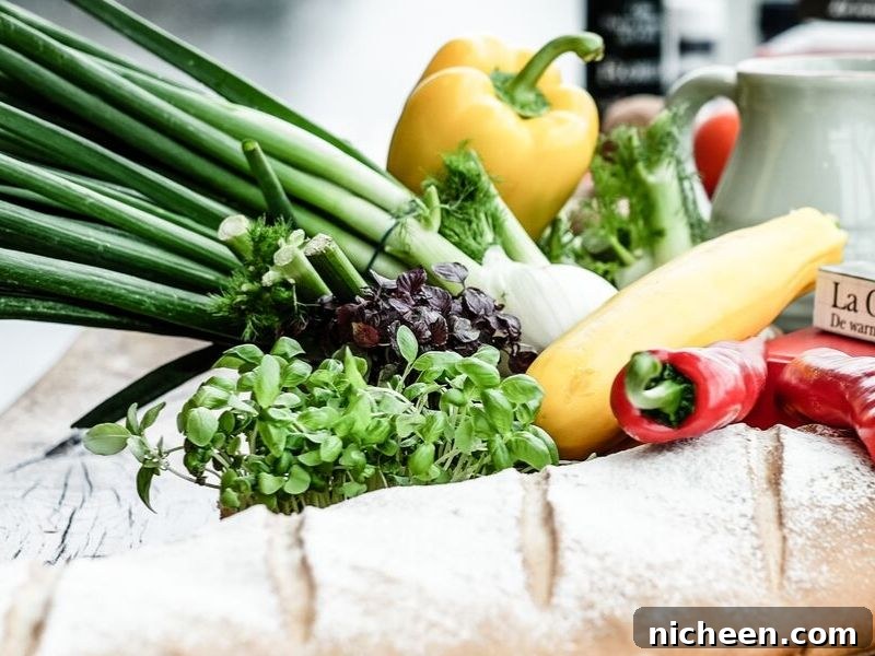 various vegetables sitting on a counter