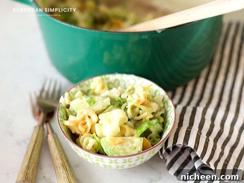 A bowl of food with mac and cheese