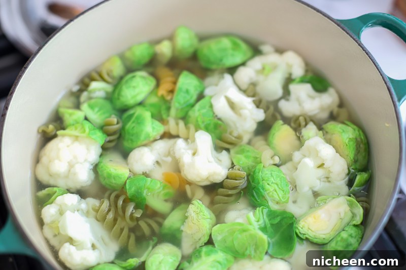 pasta and vegetables in water