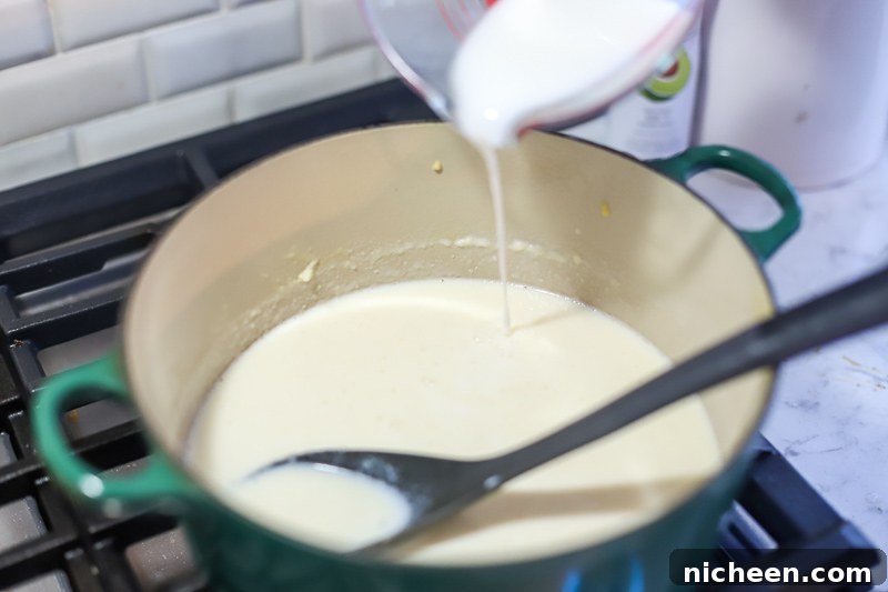 Making the sauce for Mac and Cheese