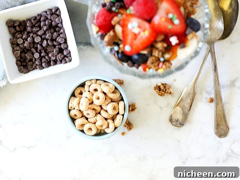 Cheerios in a bowl next to a breakfast sundae
