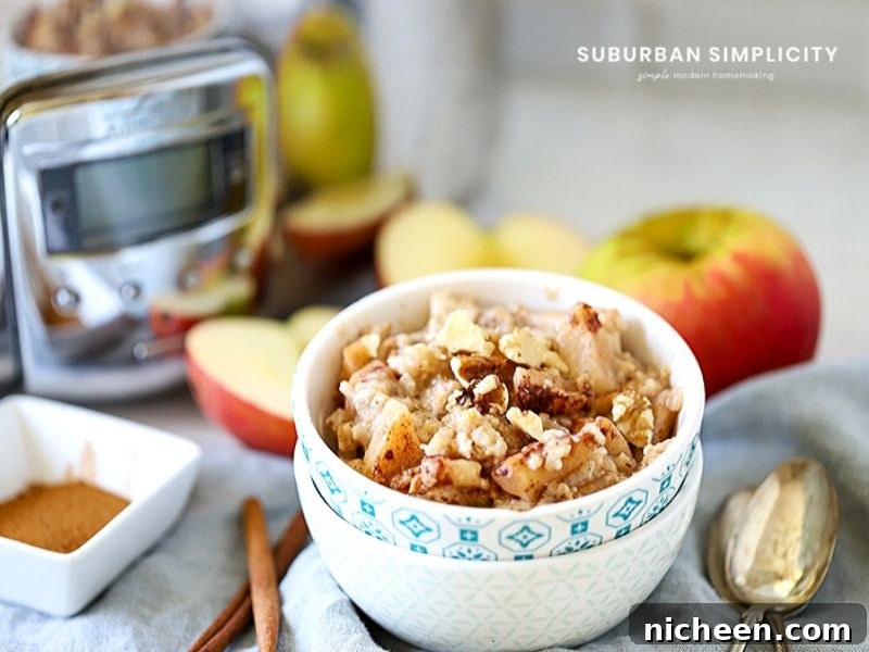 Apple Cinnamon Crockpot Oatmeal is loaded with apples and spice and is an easy breakfast. Not just delicious, but healthier than instant!