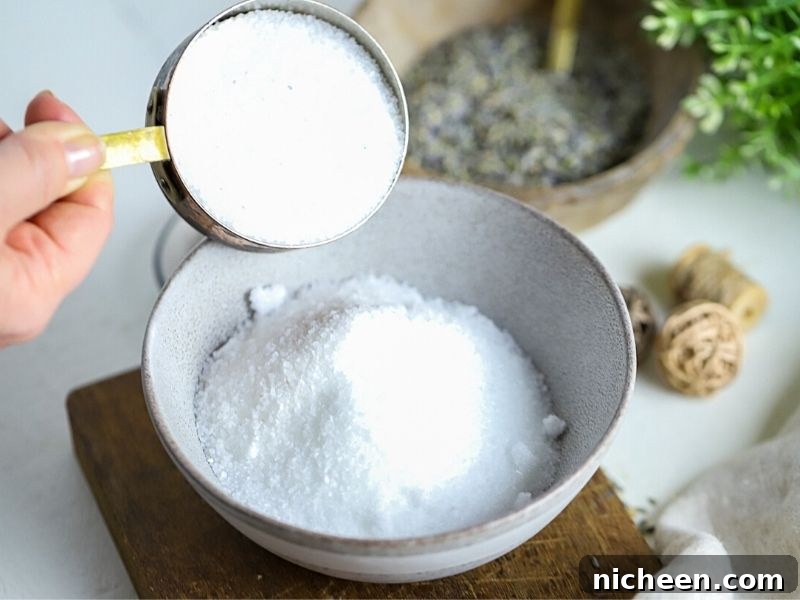 Homemade Lavender Bath Salts Recipe 5 sea salt and Epsom salt in a bowl