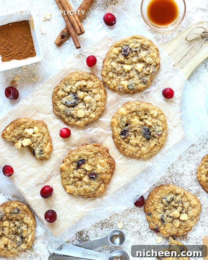 Chewy White Chocolate Cranberry Oatmeal Cookie Recipe 8 baked cookies on the counter