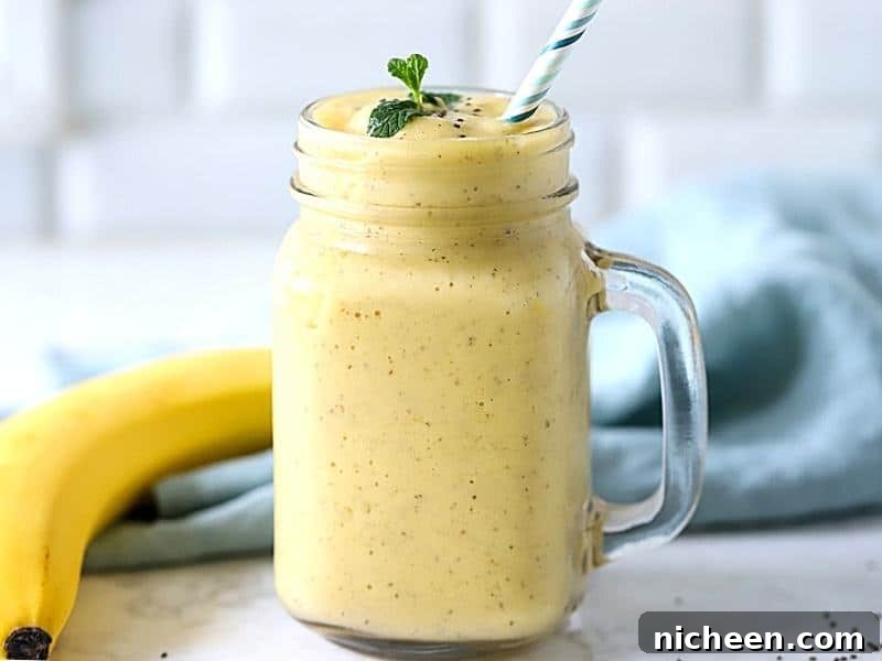 Tropical Mango Pineapple Smoothie Recipe 2 Mango Pineapple Smoothie in a mug