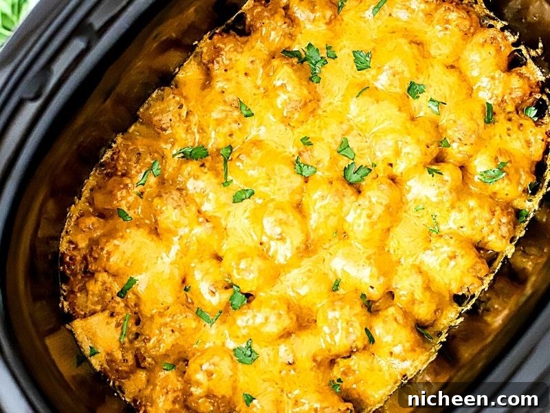 a cooked tater tot casserole in the crockpot