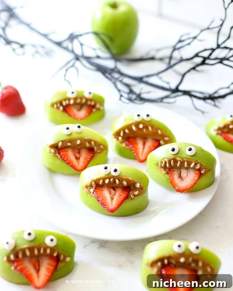 Apple Monster Mouths: Halloween Snack Recipe 5 Monster apple mouths on a white plate