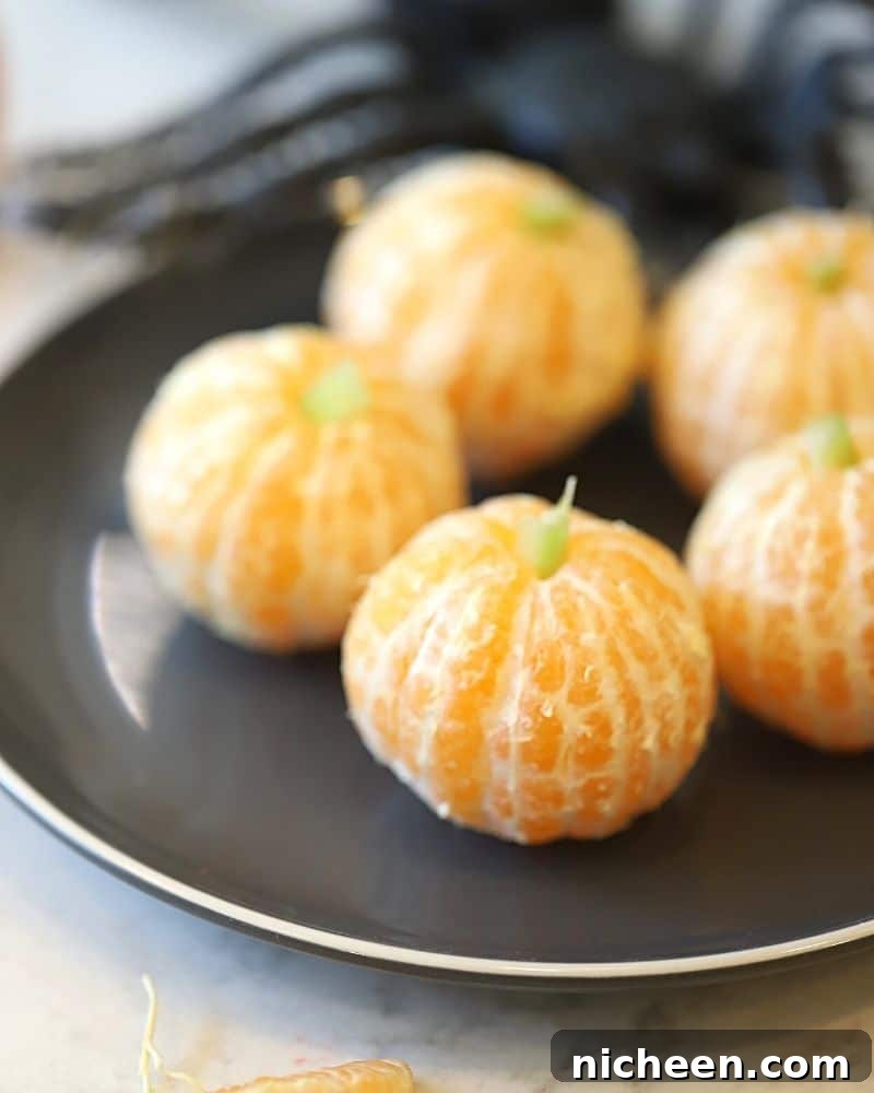 20 Wholesome Halloween Treat Recipes Kids Will Love 5 Tangerine pumpkin on a plate