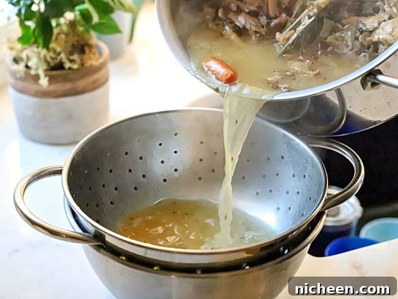 straining turkey stock