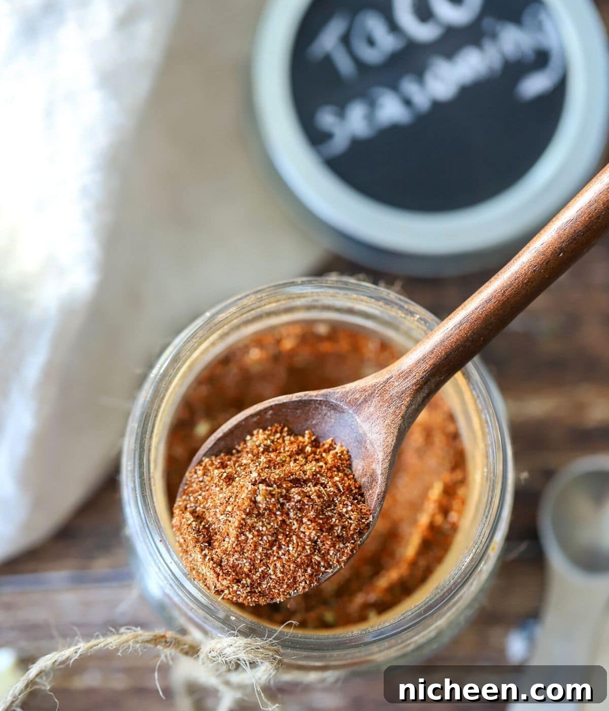 taco meat seasoning with a spoon in it.