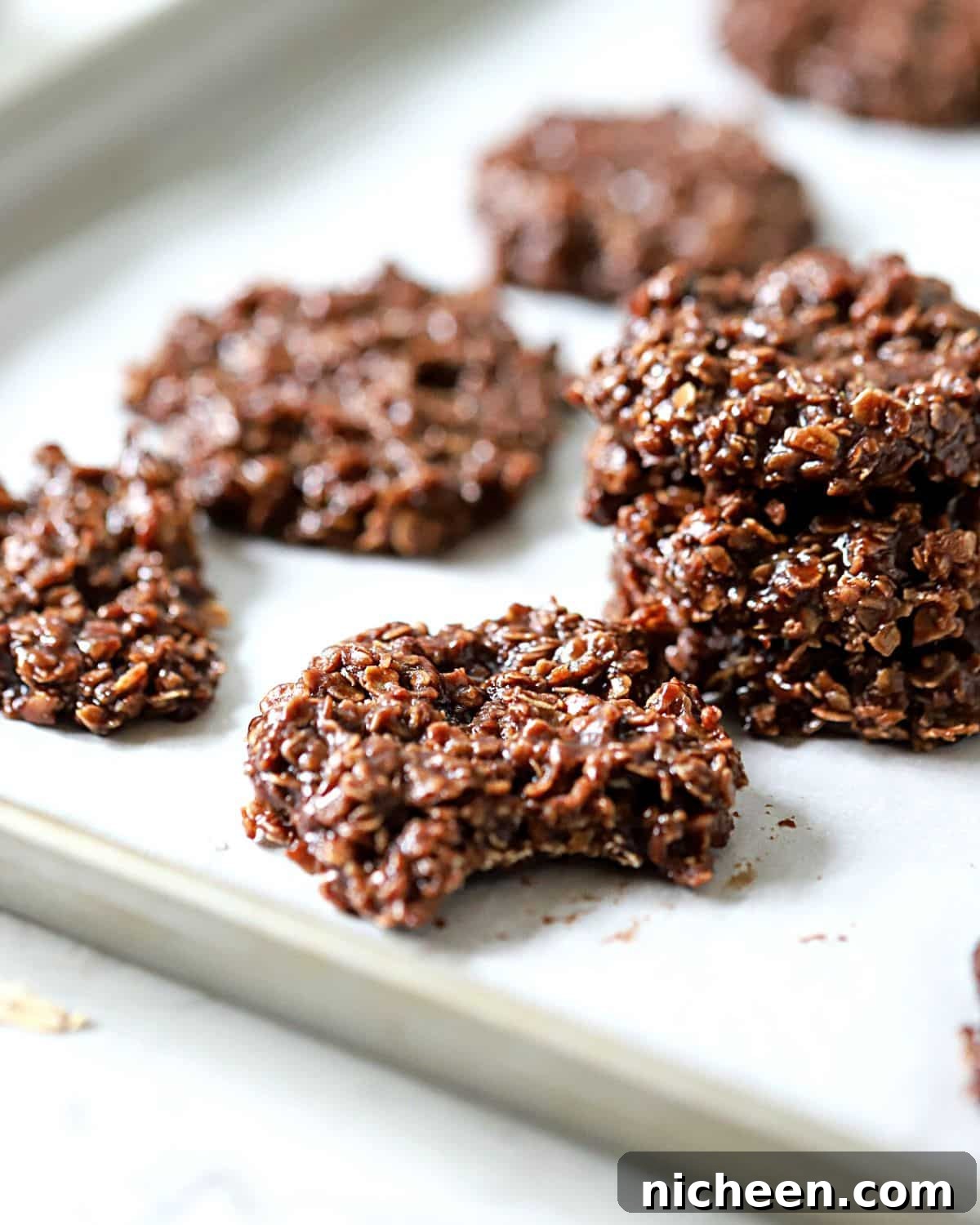 Peanut-Free No-Bake Chocolate Oat Cookies 9 no-bake cookie with a bite out.