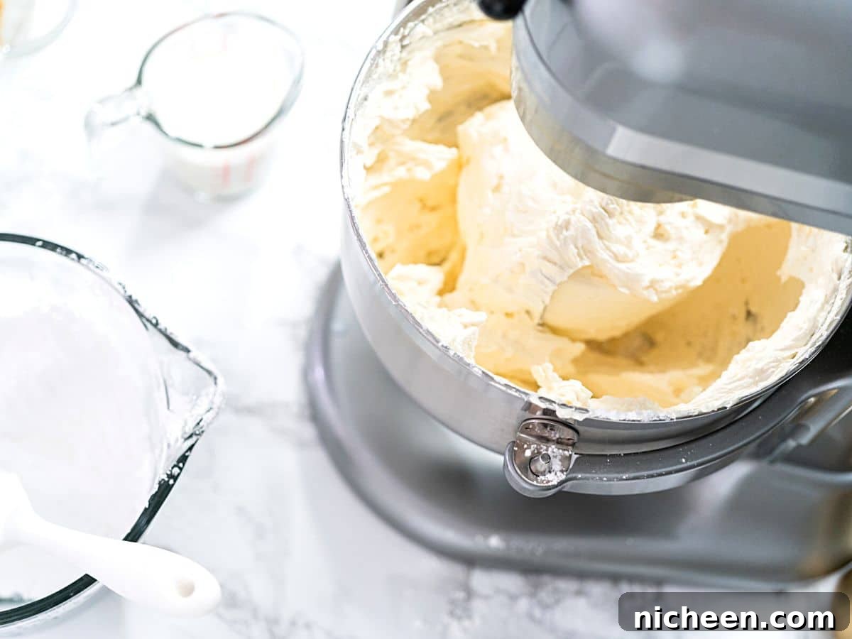 cream cheese in a stand mixer.