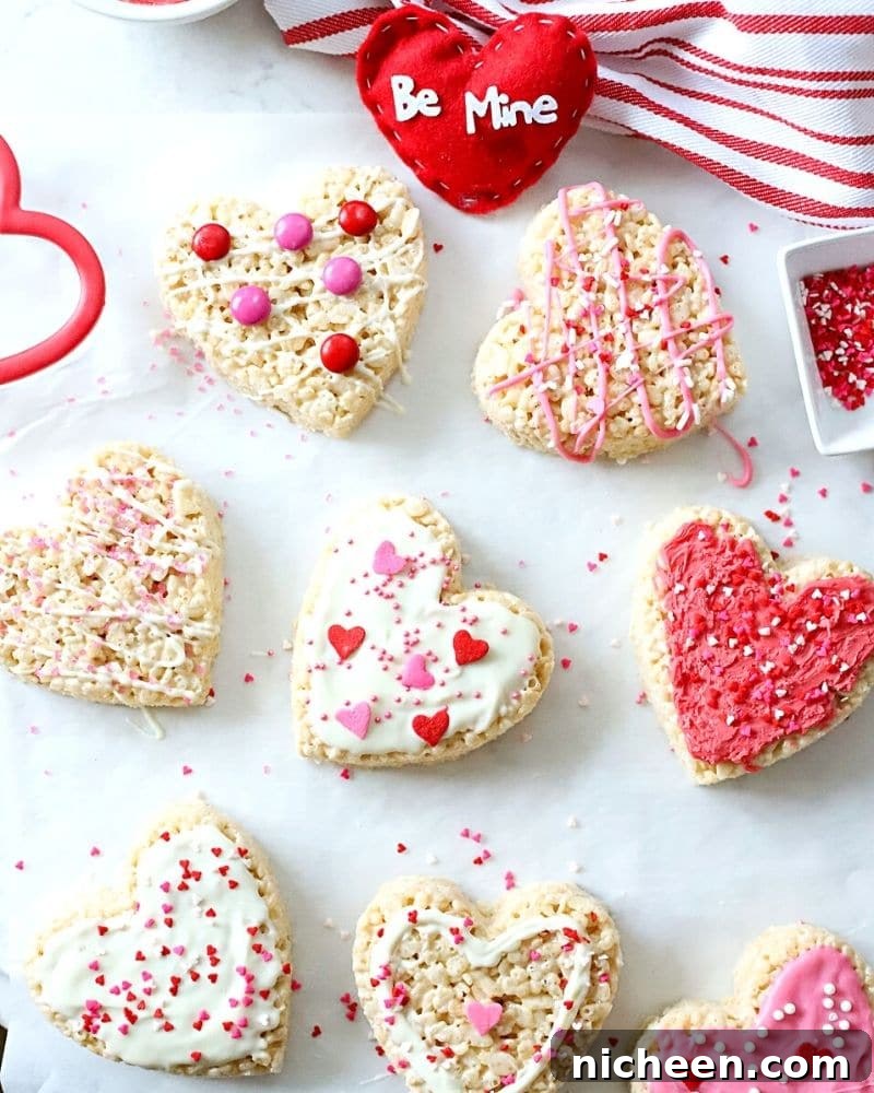25 Cute DIY Valentine's Day Treats to Make and Gift 3 Rice Krispie Treats in a heart shape