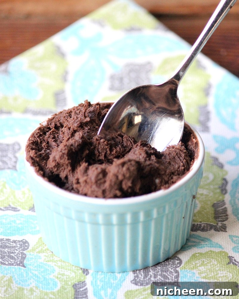 Creamy chocolate frosting to fill dark chocolate cookie cups.
