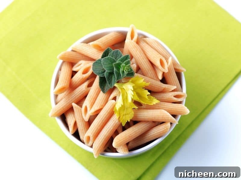 Pantry Staples to Stock for Nutritious Recipes 3 whole wheat pasta in a bowl