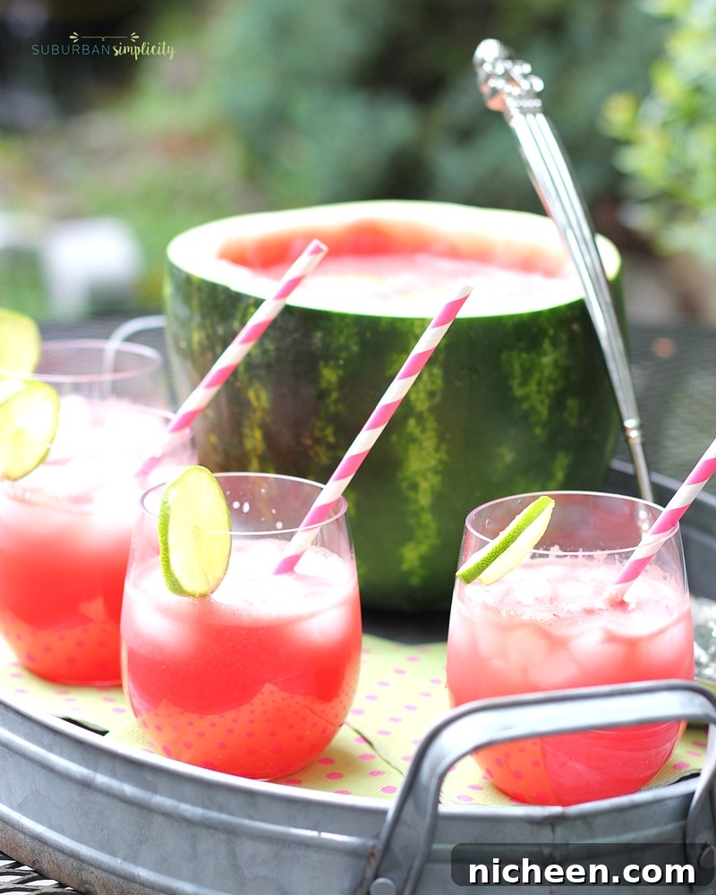 This Watermelon Punch recipe is a refreshing and delicious addition summer BBQs and get togethers! Nothing goes to waste because you turn the watermelon into a rustic serving bowl!