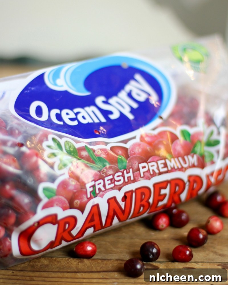 Homemade Cranberry Oatmeal Bars Recipe 3 A close up of a package of fresh Cranberries