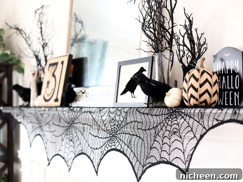 Halloween themed decorated mantel.